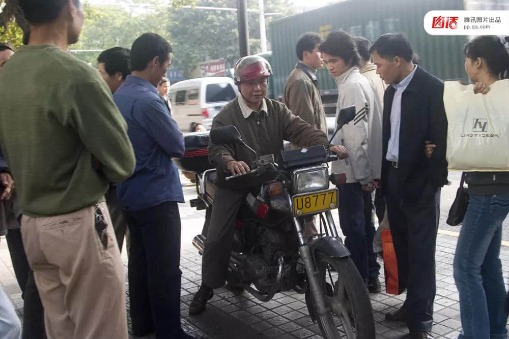 一辆摩托车,折叠了三个时代的广州 一辆摩托车,折叠了三个时代的广州