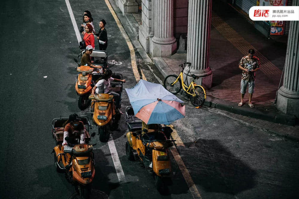 一辆摩托车,折叠了三个时代的广州 一辆摩托车,折叠了三个时代的广州